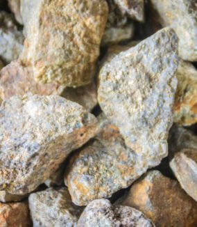 Pyrite stones for sale at the Thai-Cambodia border market. The mineral pyrite, or iron pyrite, also known as fool's gold, is an iron sulfide with the chemical formula FeS2.